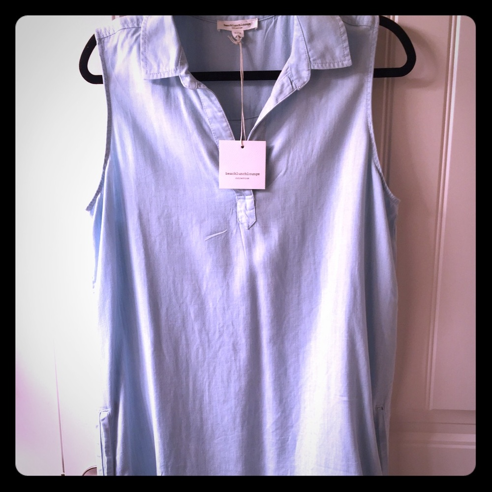 Chambray tank dress with pockets. Light wash denim